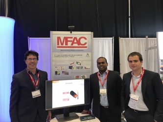 Our representatives in Canada and QForm manager Ivan Lishniy at our booth